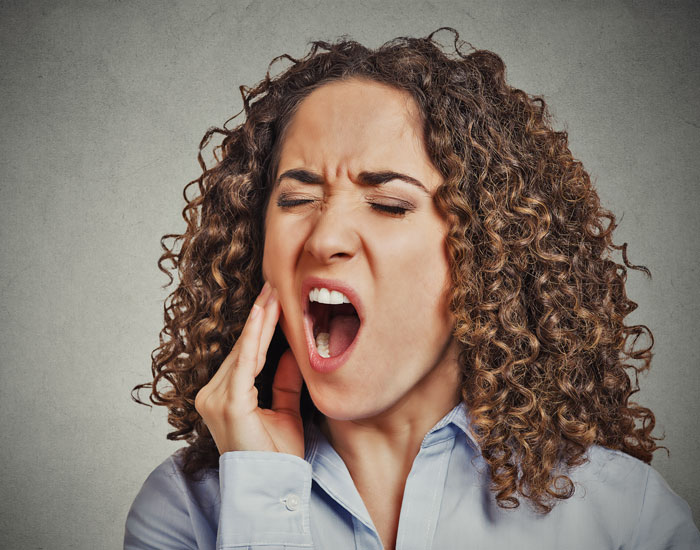 woman with jaw pain
