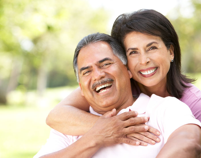 smiling middle aged couple