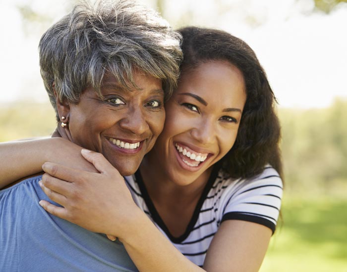 mother and daughter hugging